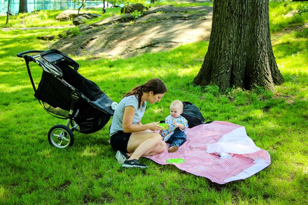 Our family picnic in Central Park is a good example of the quality family time your get while traveling with a baby