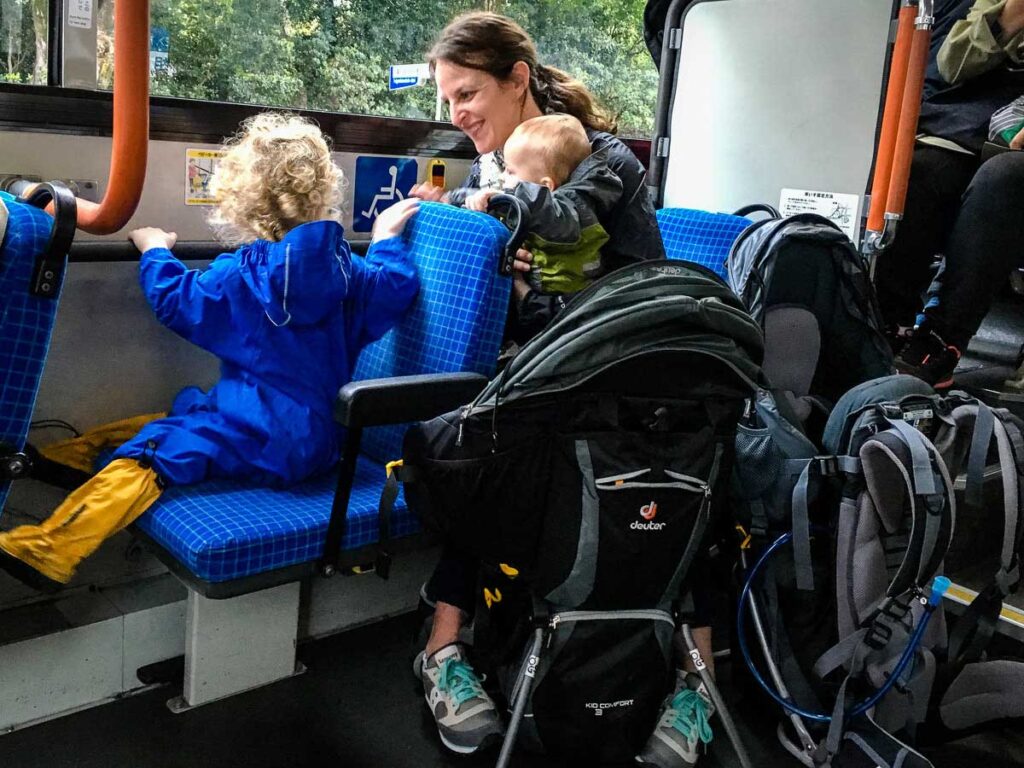 travel with baby backpack carrier on bus in Kyoto