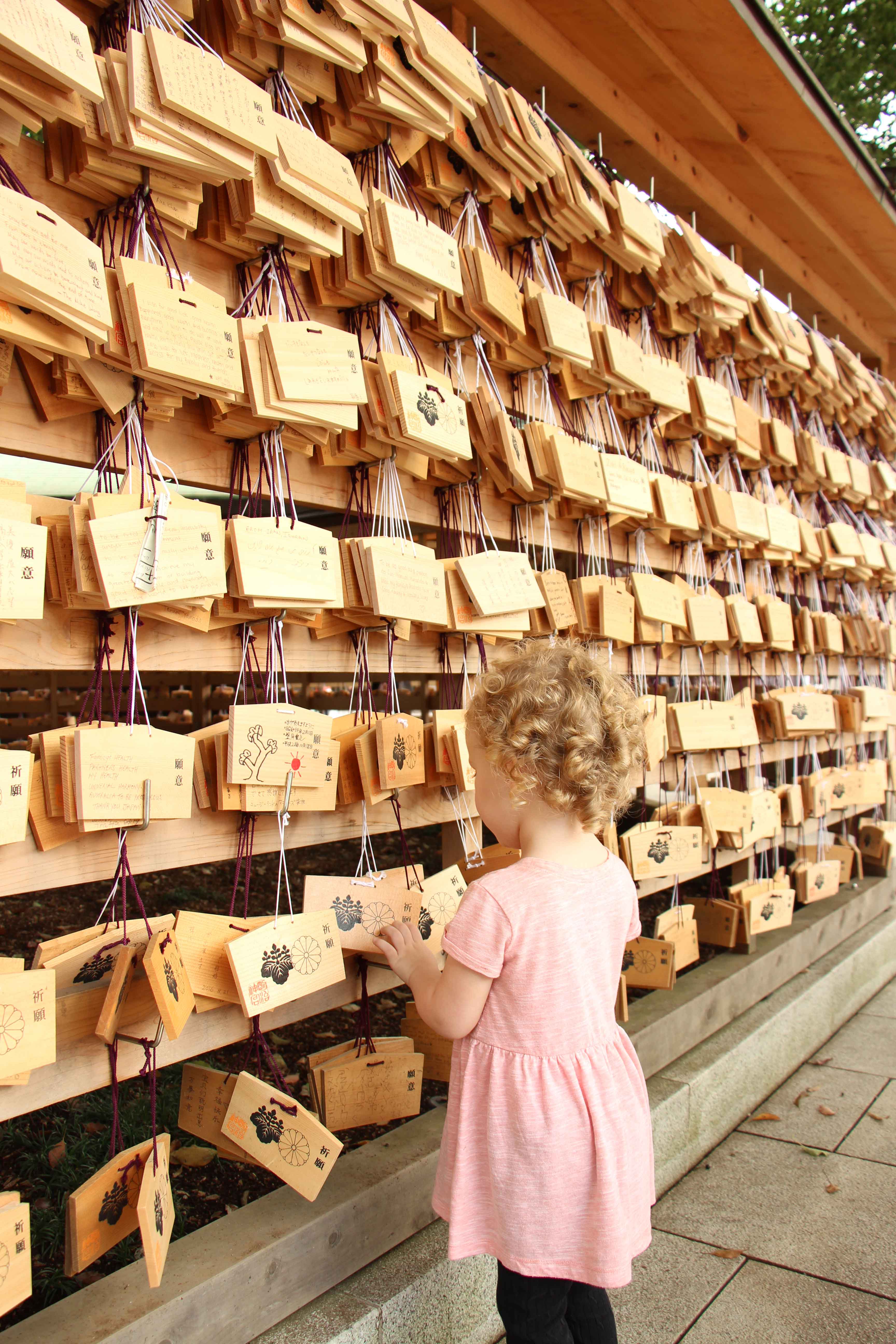 A great thing to do in Tokyo with a toddler is to visit the Meiji Shrine and write a wish on an ema