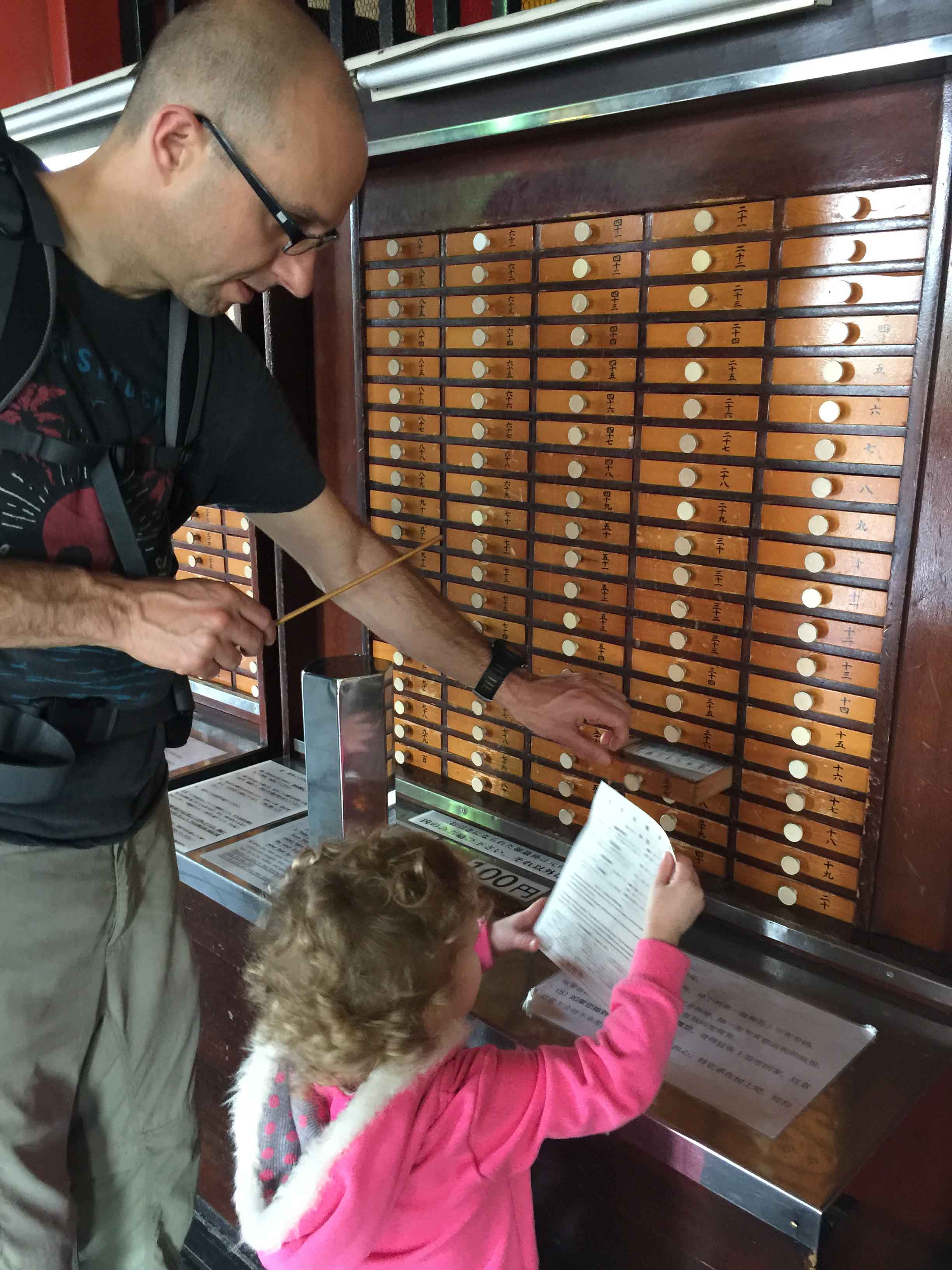 reading your fortune at the Sensō-ji temple was one of the best things to do with kids in Tokyo