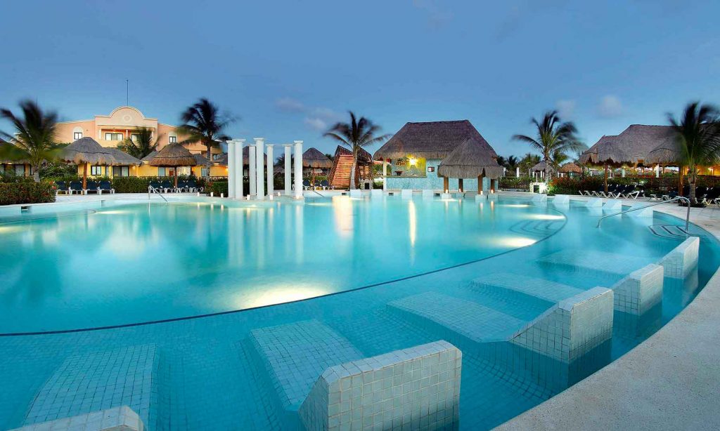 Pool lit up at night - Grand Palladium Kantenah all-inclusive resort in mexico 