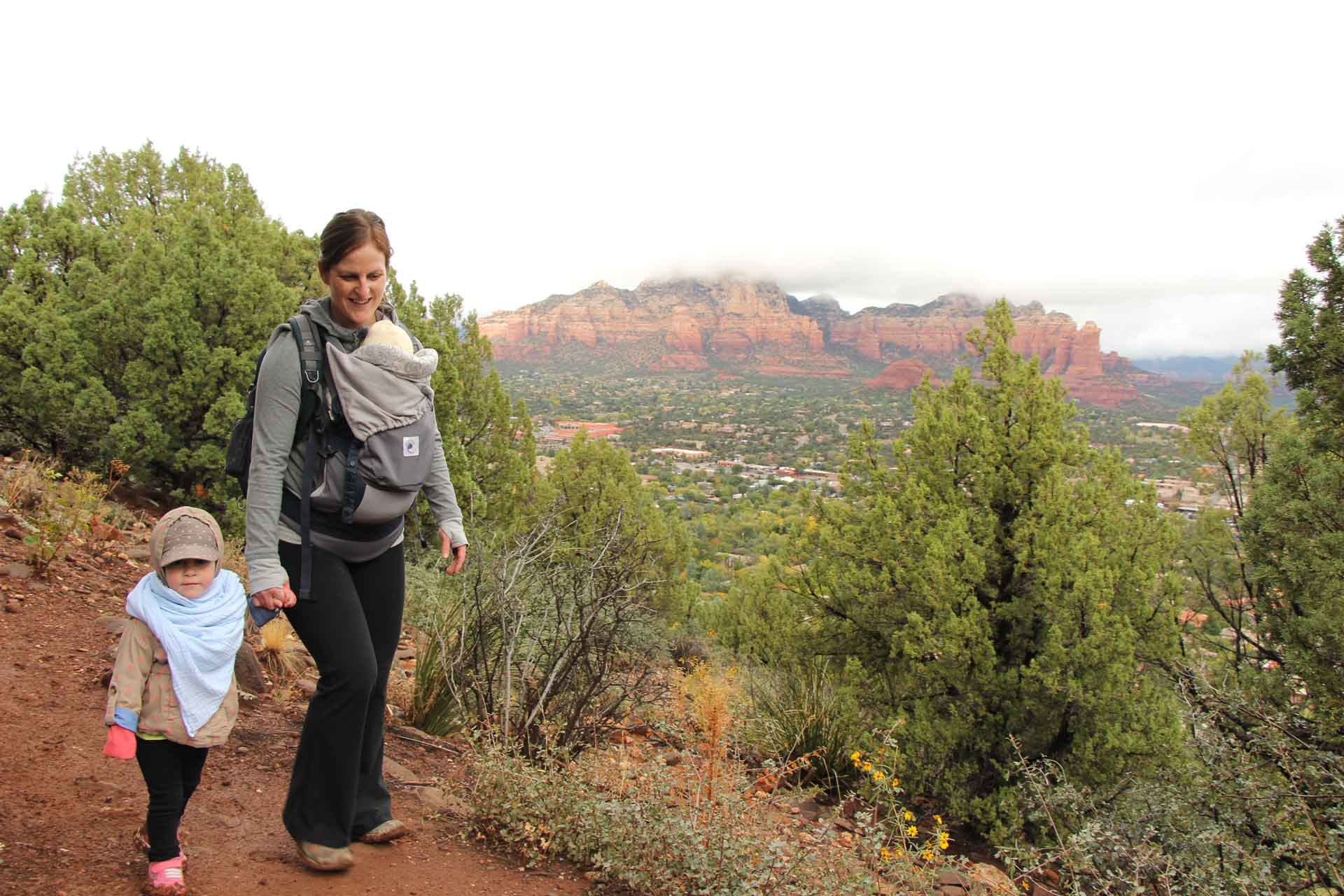 A mother enjoys Sedona hikes with her kids - a baby and toddlernd toddler