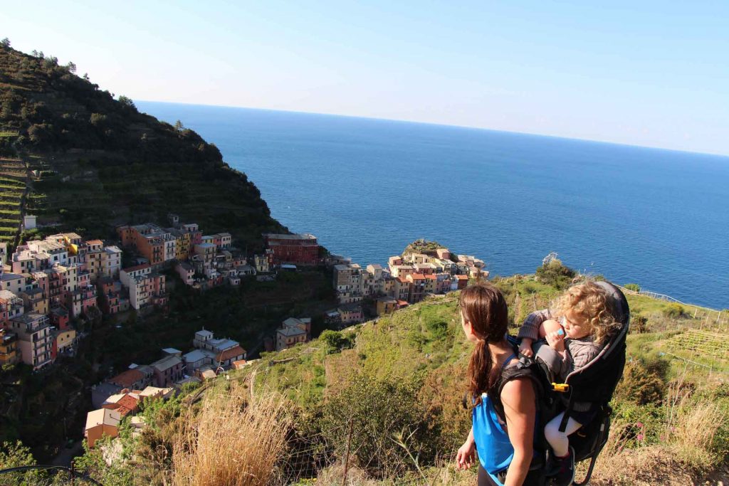 hiking overtop Manarola, Cinque Terre with our toddler in a backpack carrier. We do not recommend bringing a stroller to Cinque Terre