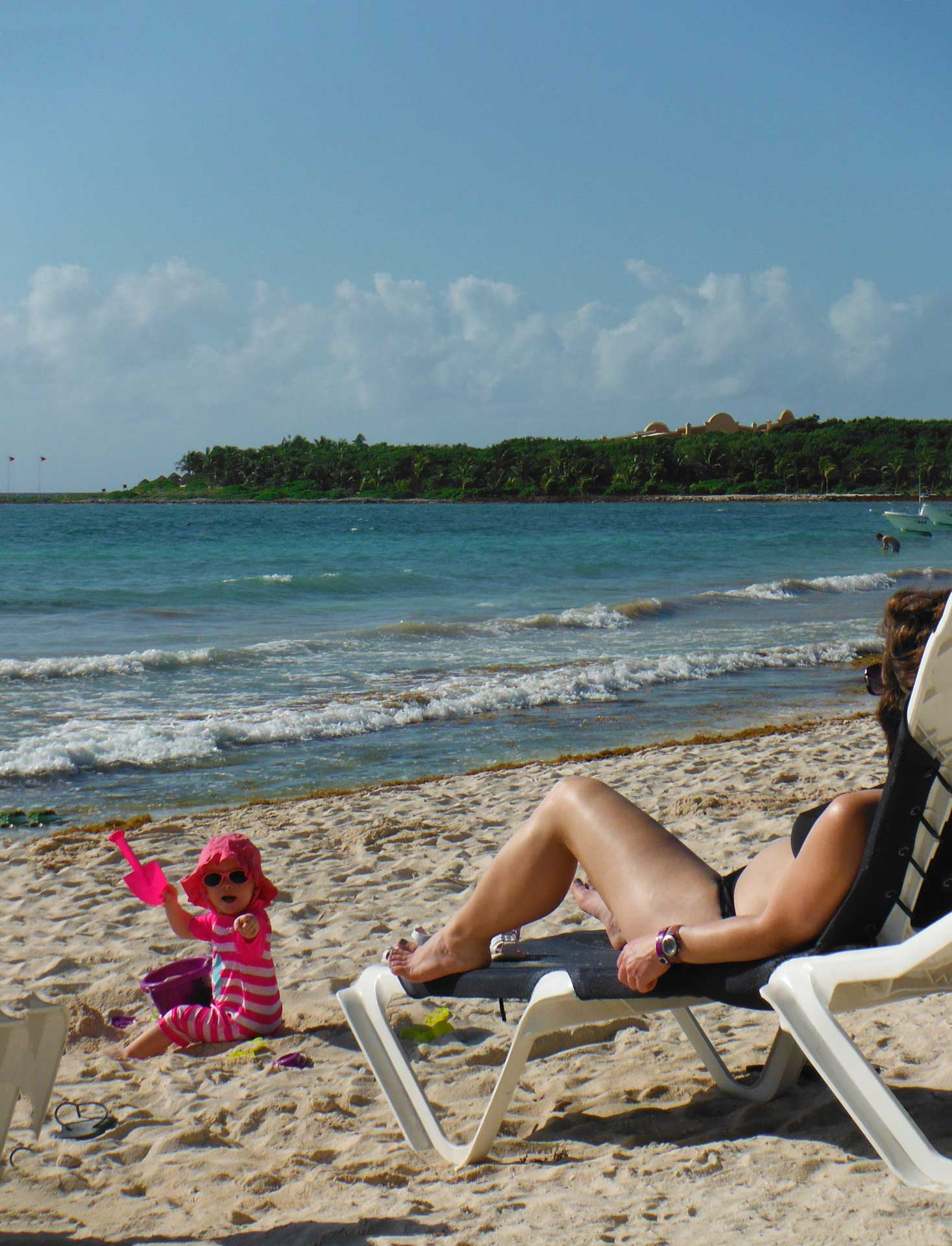 a mother enjoys her second babymoon with her toddler at an all-inclusive resort in Mexico.