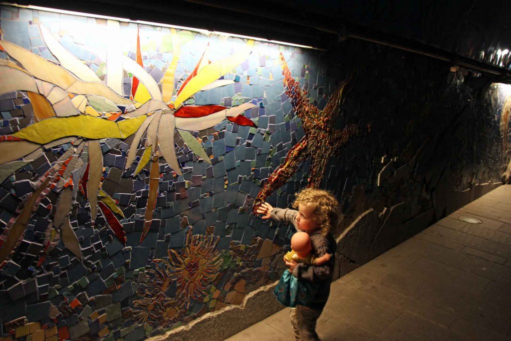 The tile mosaics in the tunnel near the Riomaggiore train station is a fun thing to do in Cinque Terre with a toddler