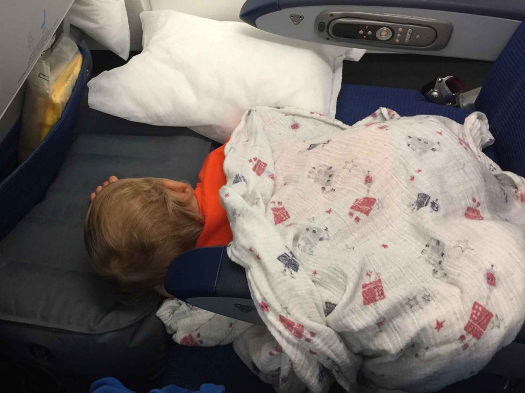 getting toddler to sleep on flight