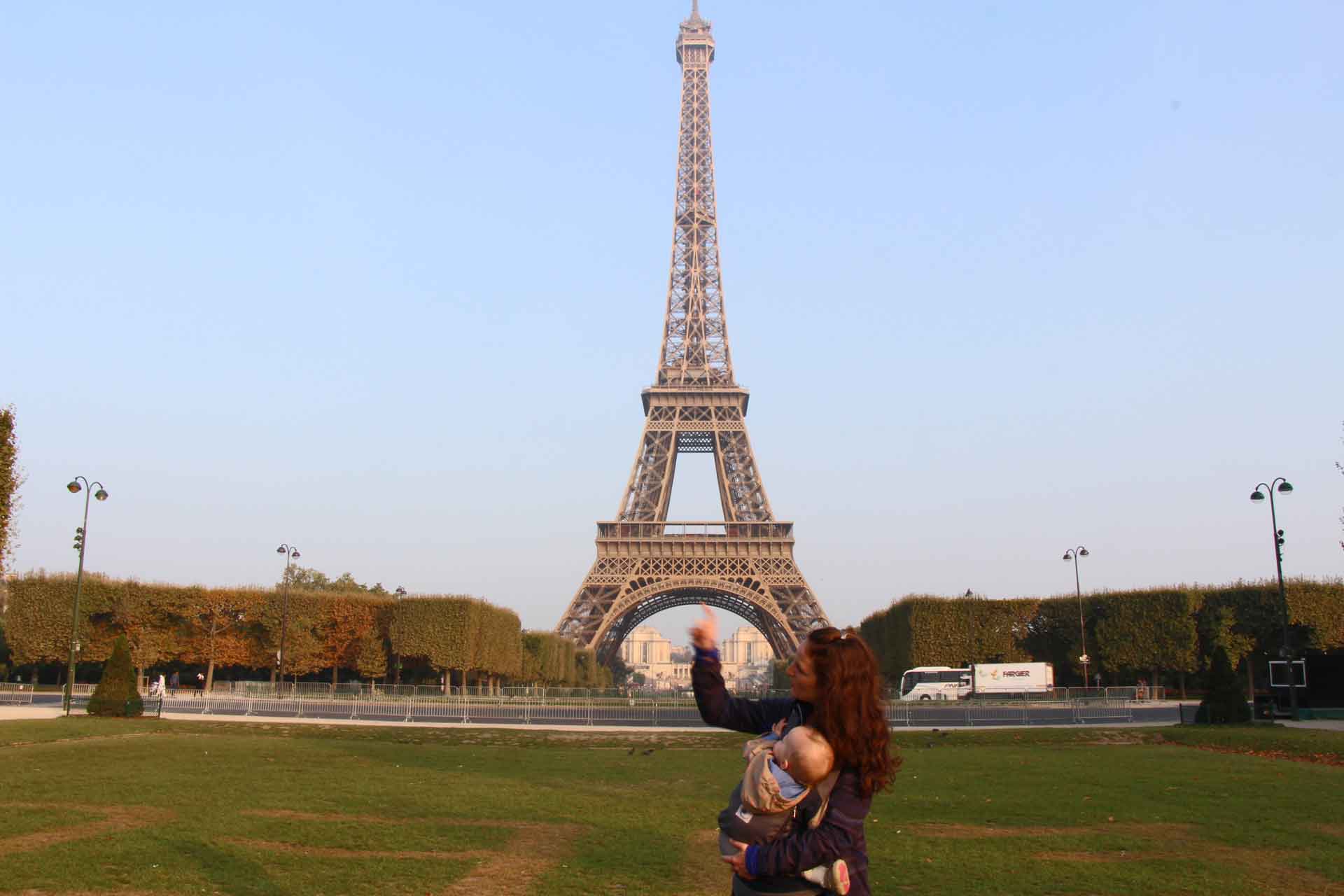 Celine Brewer shows her 9 month old baby the Eiffel Tower in Paris, France.