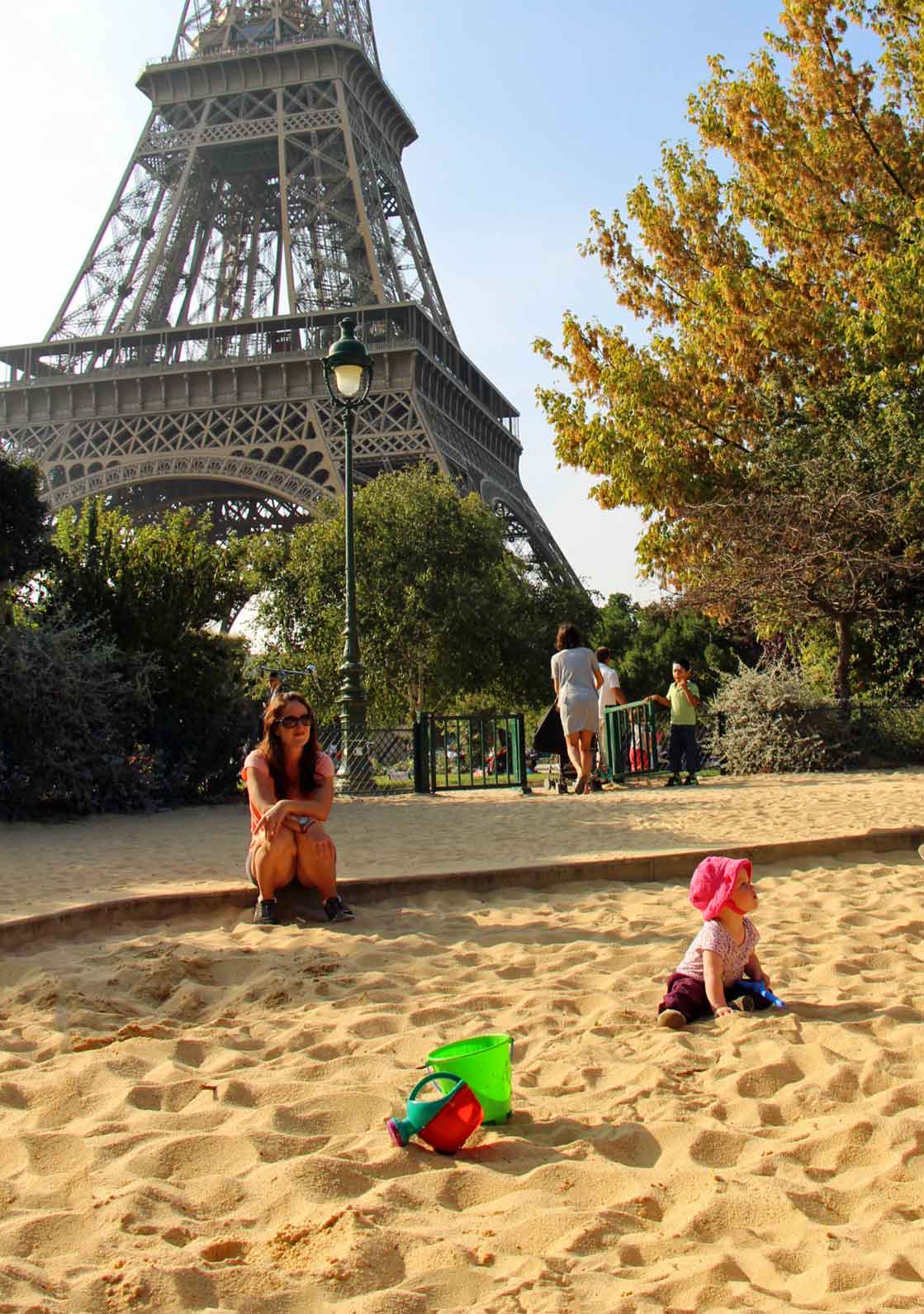 when traveling to europe with a baby, you get experiences such as a playground in the shadow of the Eiffel Tower