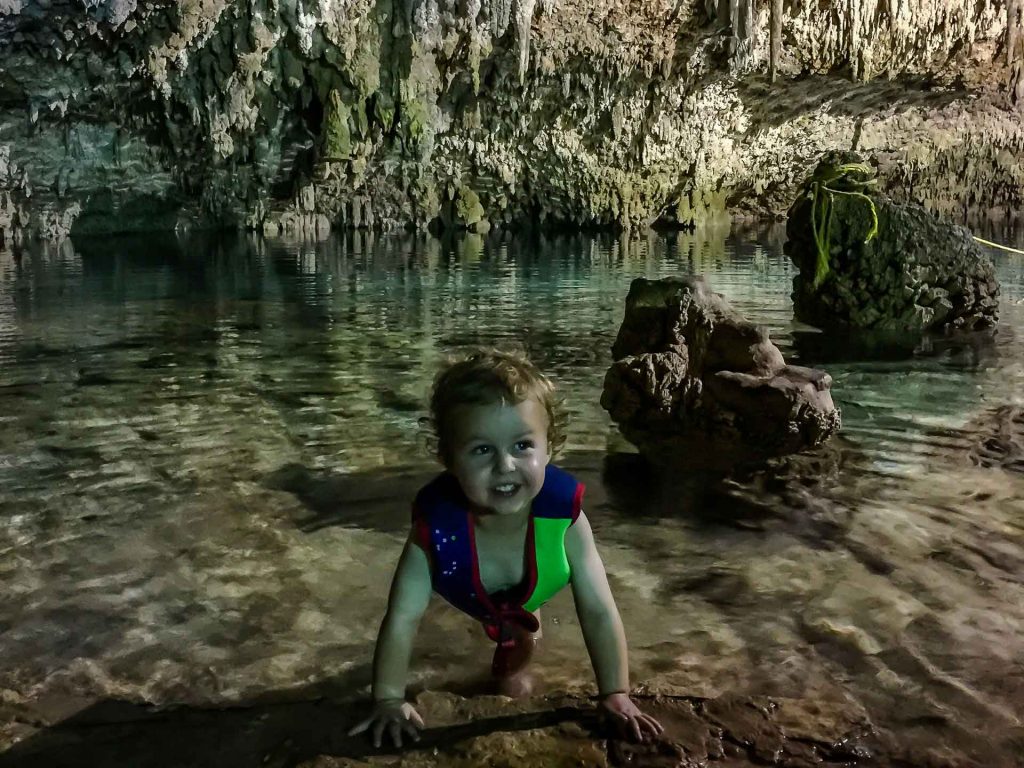 Choo-ha cenote in Mexico with toddler