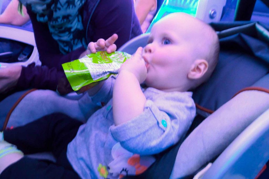 Flying with baby in car seat.