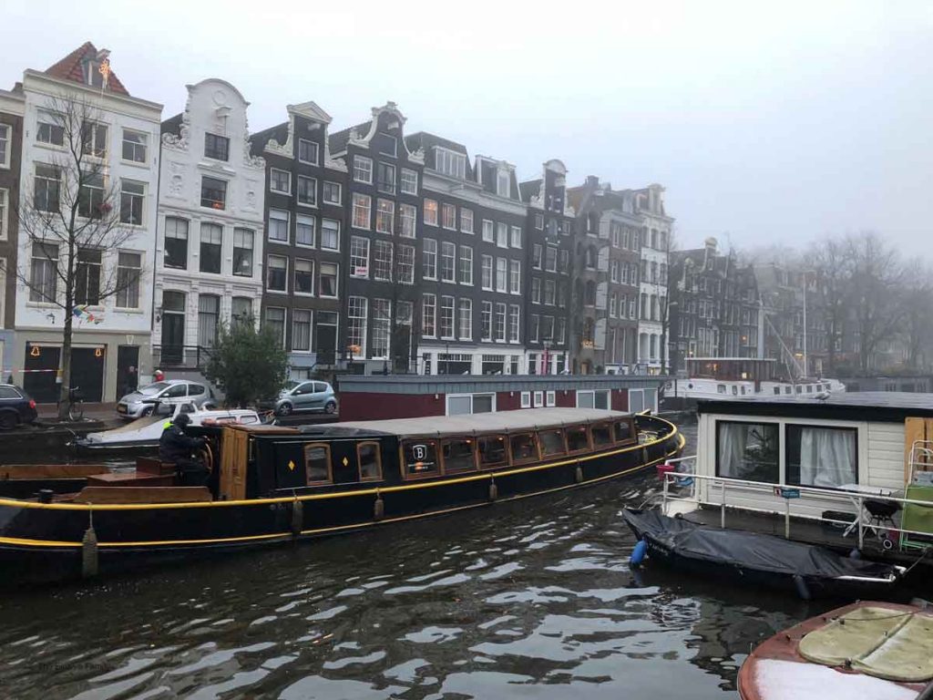 The famous canals of Amsterdam - one of the best places to travel with a baby in Europe.
