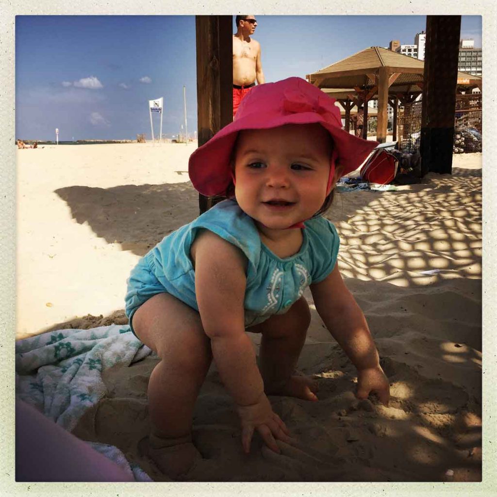 a baby has fun on a family trip to Israel - a family friendly destination in the middle east.