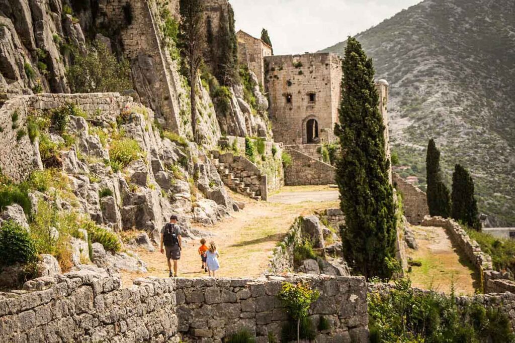 a family visits the Klis Fortress while on a toddler friendly vacation to Split, Croatia