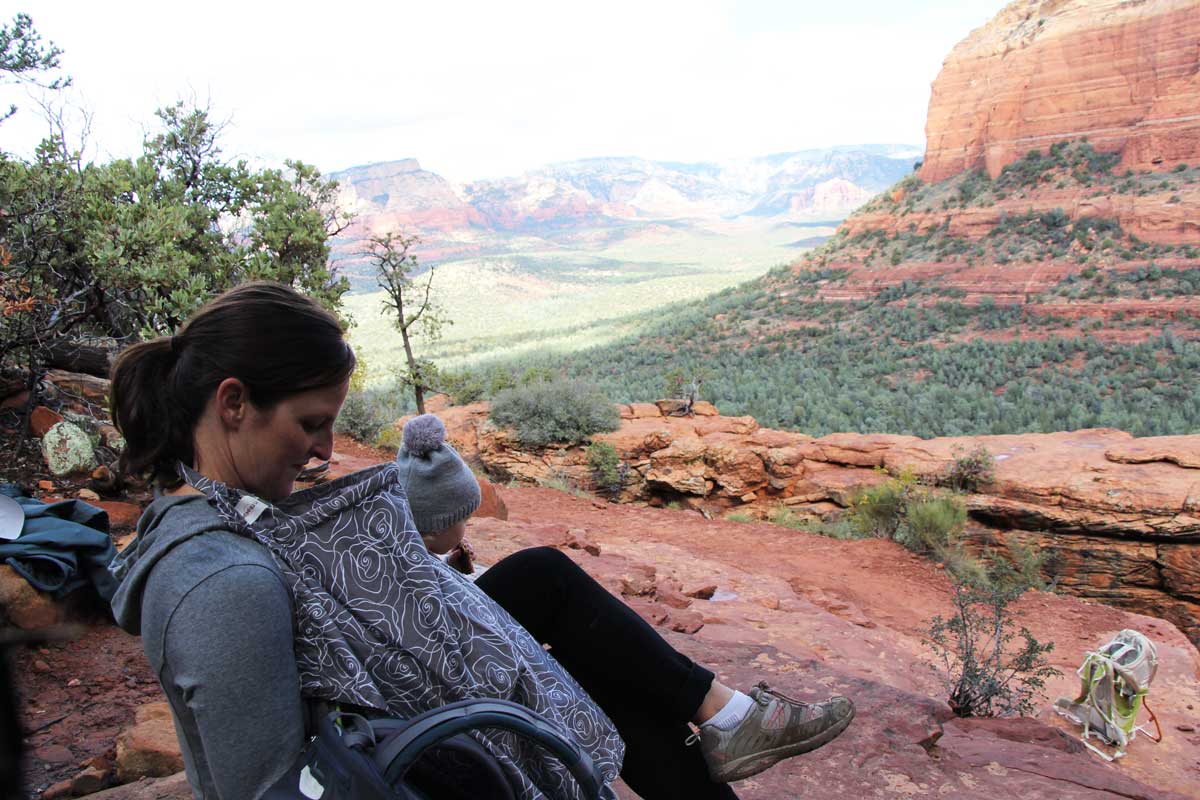 Celine Brewer, from BabyCanTravel.com, uses a nursing cover while hiking in Sedona with her baby.