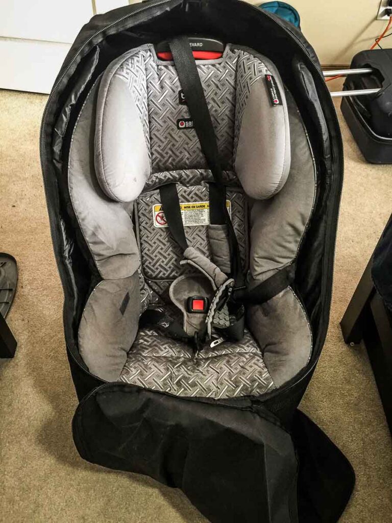 a travel car seat in a car seat travel bag for extra protection