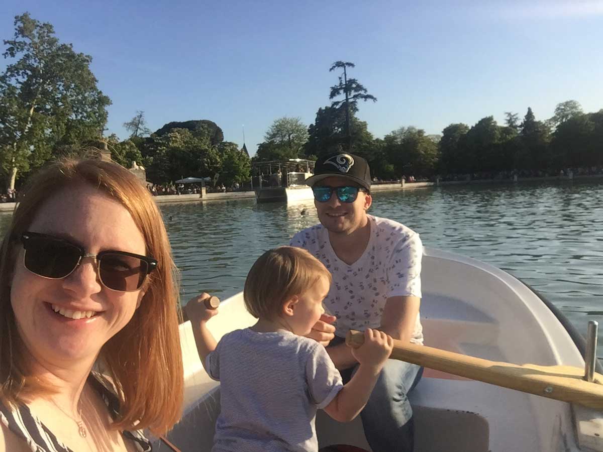 image of family on boat on Lake Retiro in Madrid Spain