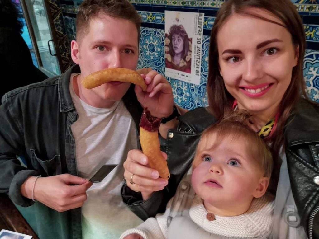 image of family eating churros in seville spain