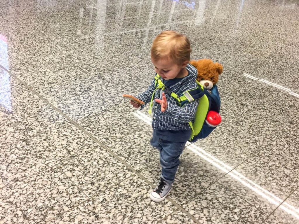 Bringing your toddler's favorite stuffy is an effective strategy to help avoid a toddler tantrum while flying.