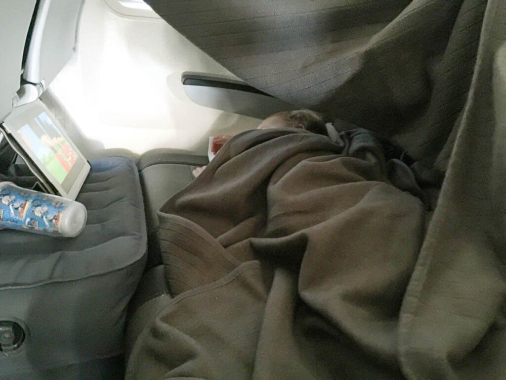 image of flight bed for toddler on airplane