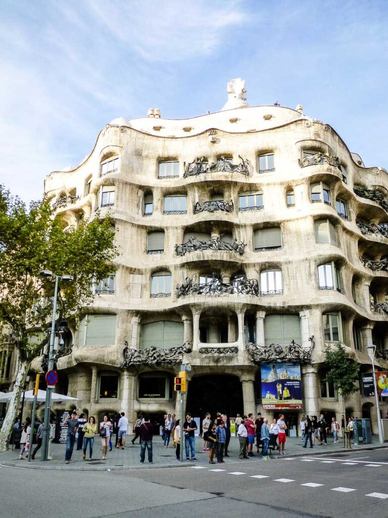 exterior of La Pedrera in Barcelona with a toddler or baby 