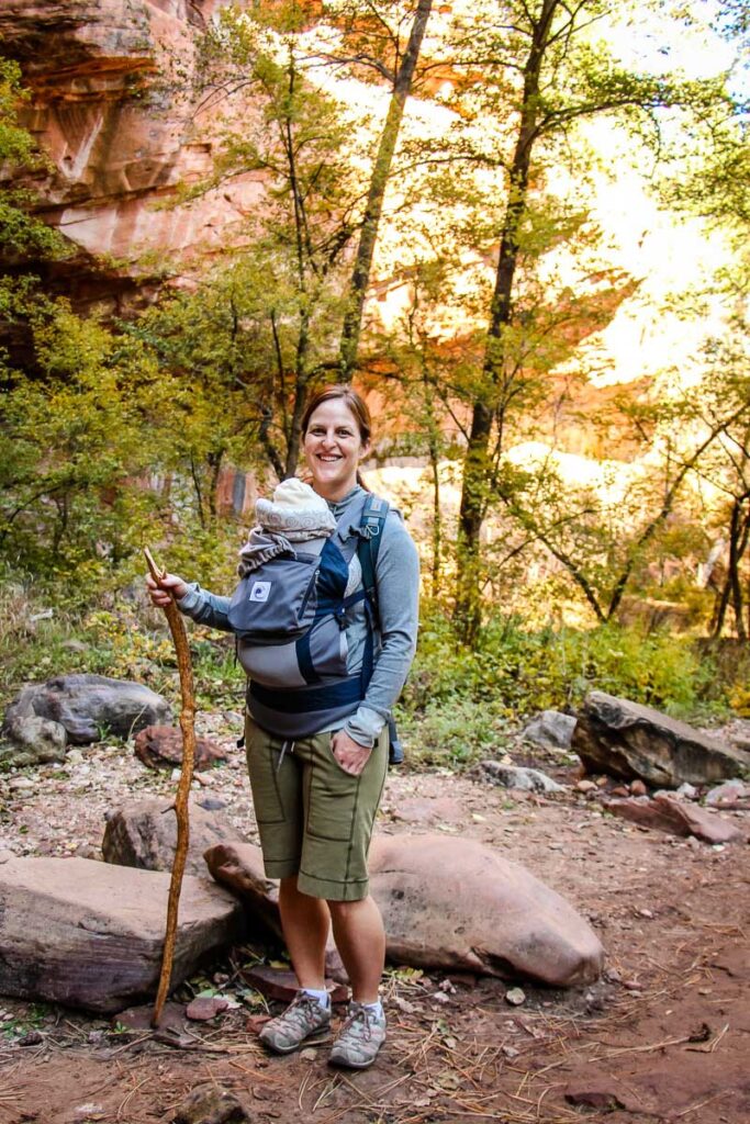 Celine Brewer, owner of BabyCanTravel.com, goes hiking with her baby in an Ergobaby carrier.