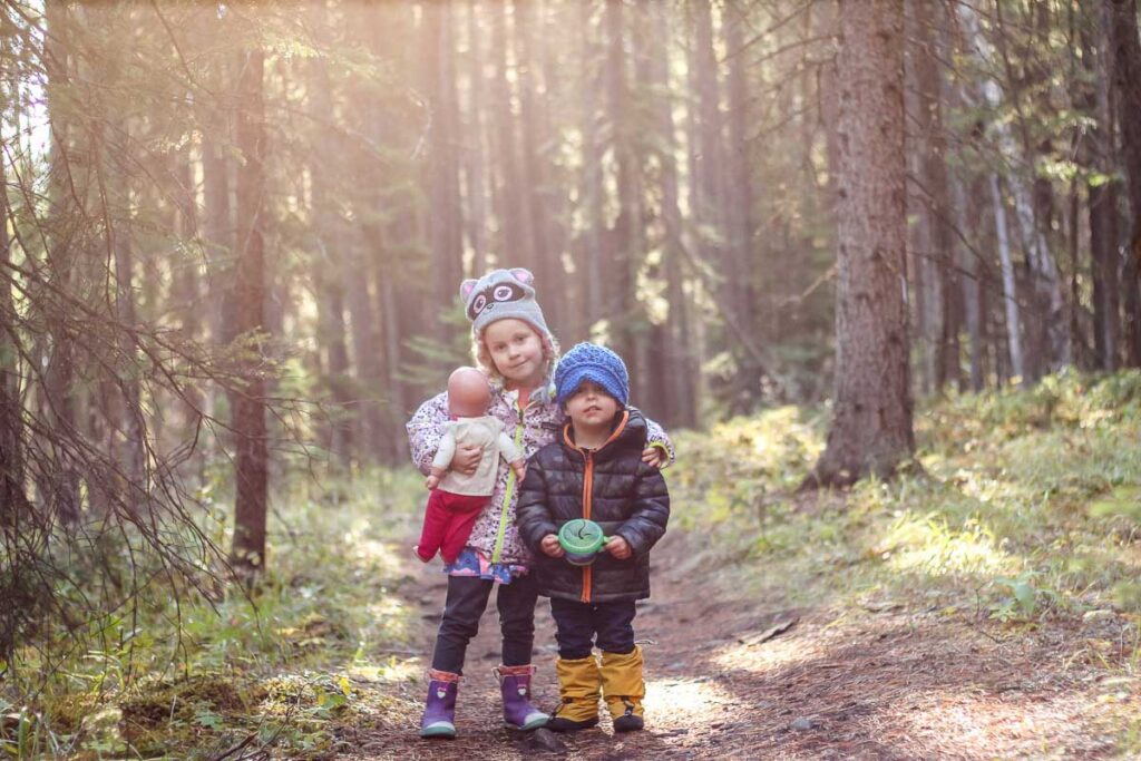 Hiking with a 3 year old (and her dolly) and a toddler with his snack cup.