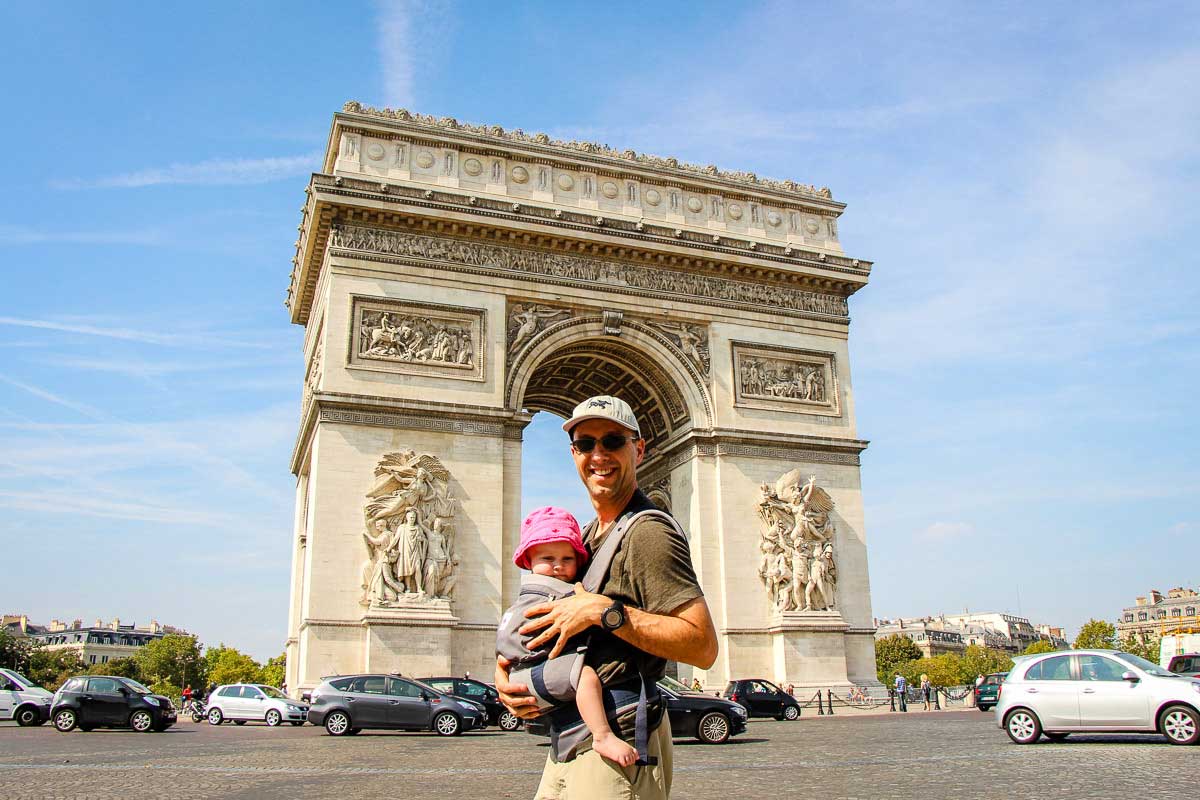 Arc de Triomphe in Paris with baby in carrier