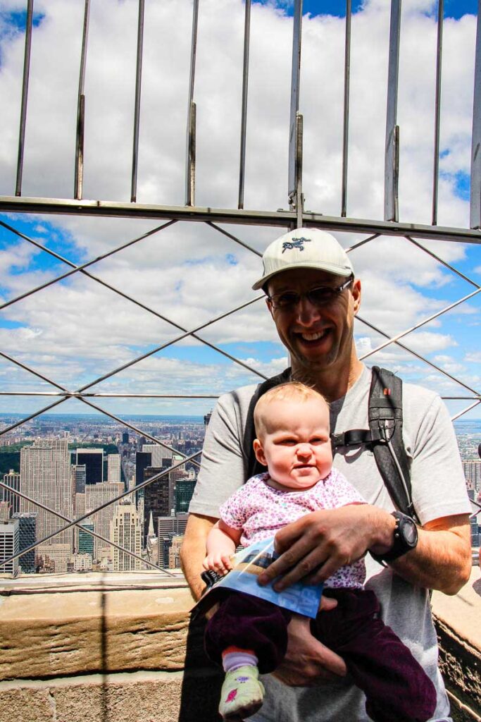 visiting empire state building observation deck in New York City with a baby