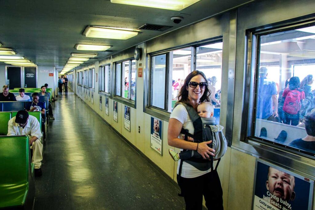 See the statue of liberty for free from the Staten Island Ferry with a baby in a baby carrier