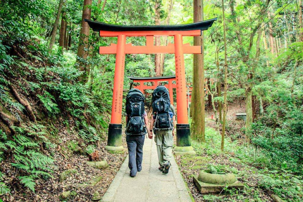 Celine Brewer and Dan Brewer, from BabyCanTravel.com, go hiking in Japan using hiking backpacks for their small children.