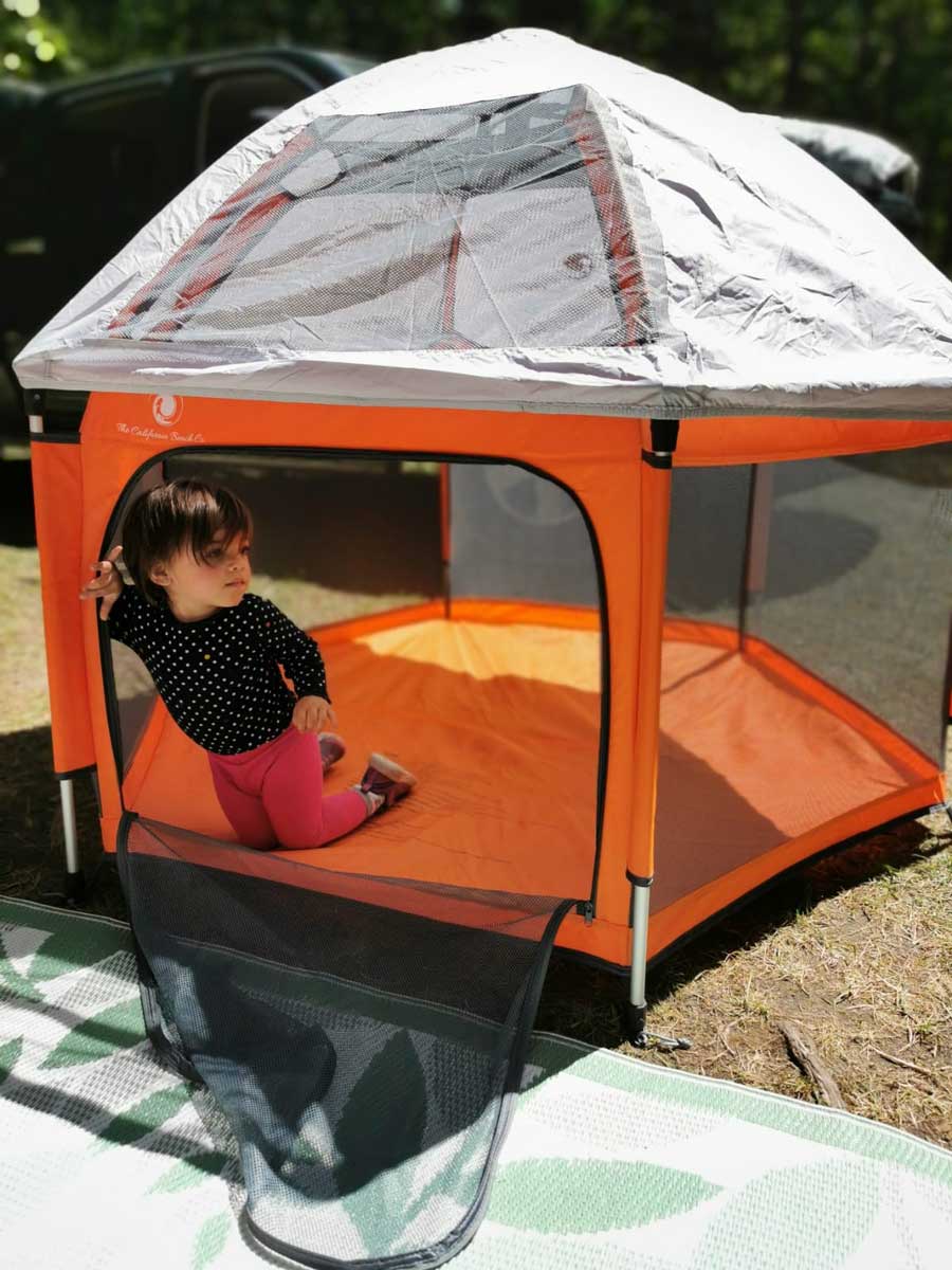 toddler in California Beach Co beach tent