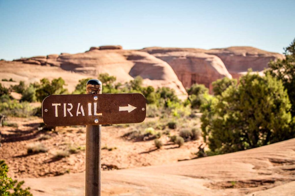 the Delicate Arch hike in Arches National Park is one of the best hikes you should do on a utah national parks road trip 