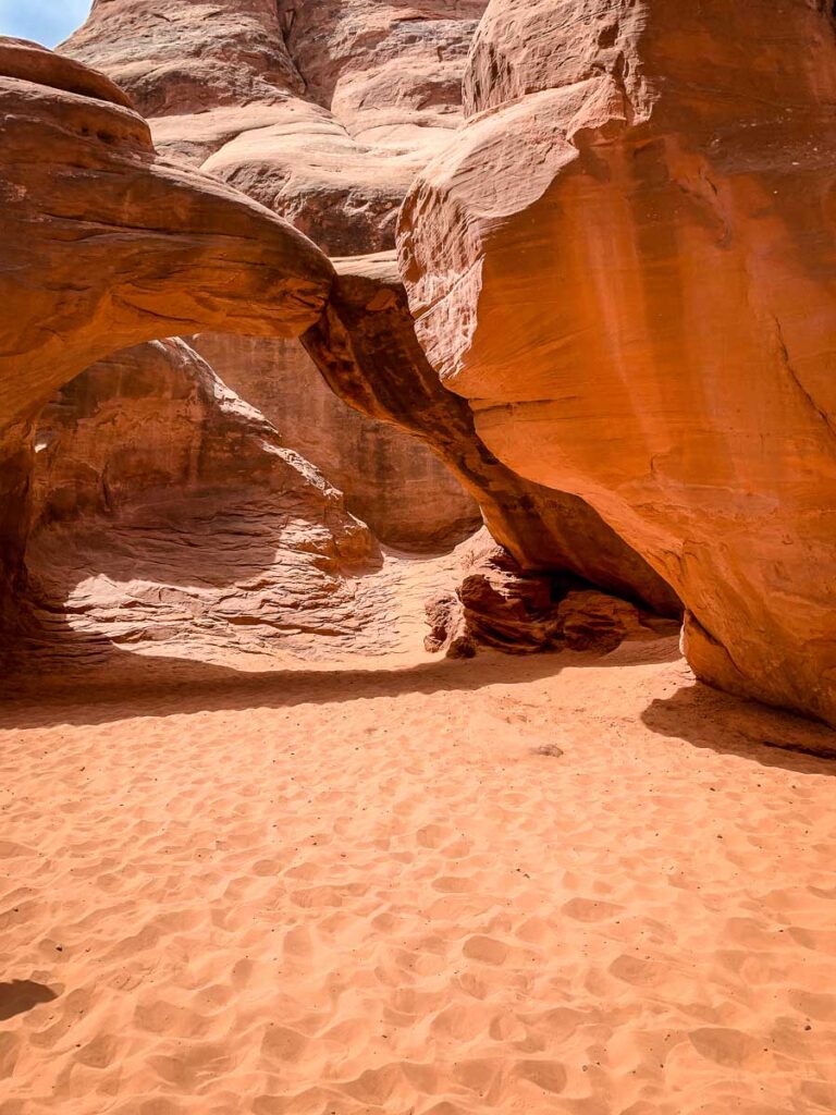 things to do with kids on your Utah road trip - Sand Dunes Arch - best easy hikes with toddler in Arches National Park