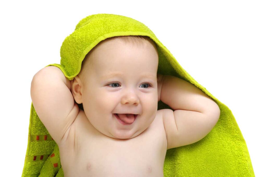 Baby with green towel