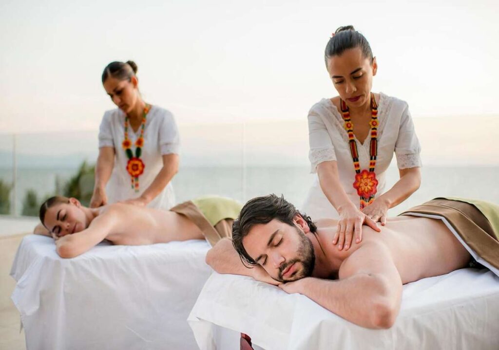 a couple gets a massage at the Grand Velas Riviera Nayarit - a very baby friendly resort in Mexico with a spa.