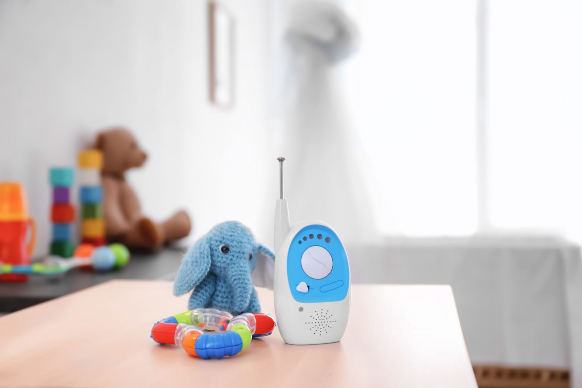 baby monitor for travel on table with two baby toys