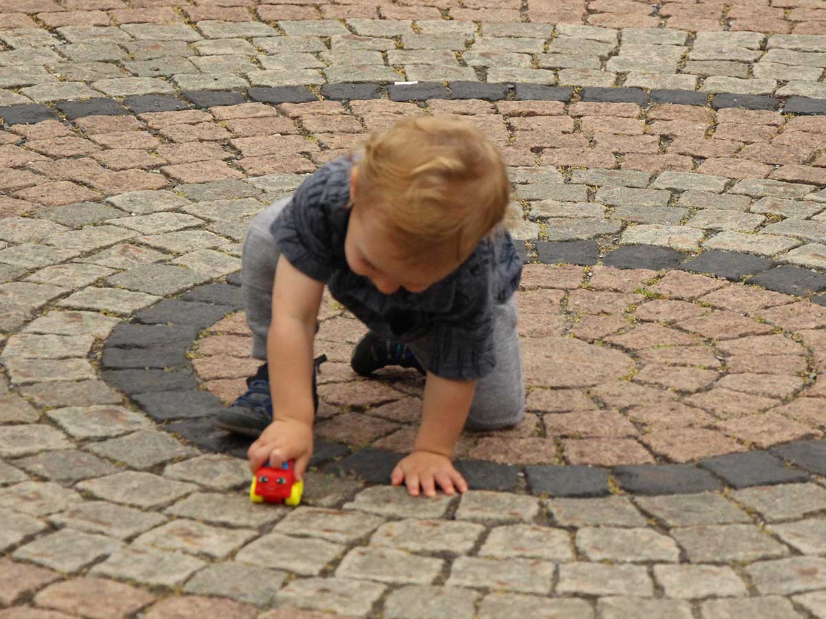 2 year old playing with toy car, one o fthe best 2 Year Old Travel Toys