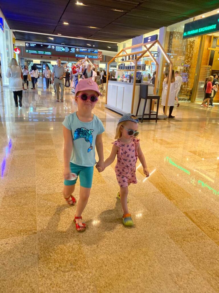 kids walking in Dubai Mall where there are tons of fun kid activities