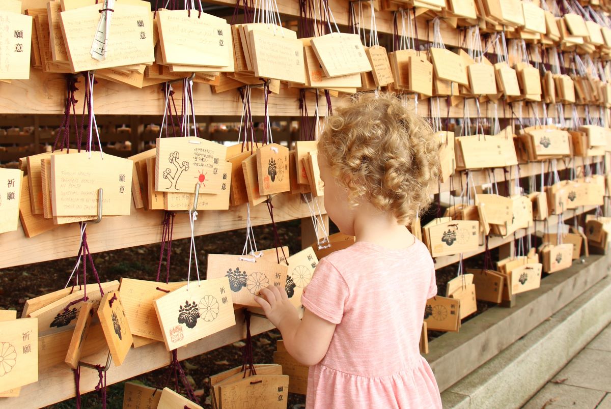 a toddler visits the Meiji Shrine on a family trip to Tokyo.