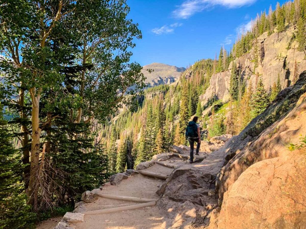 woman on Bear Lake Hike - Easy hikes in Rocky Mountain National Park