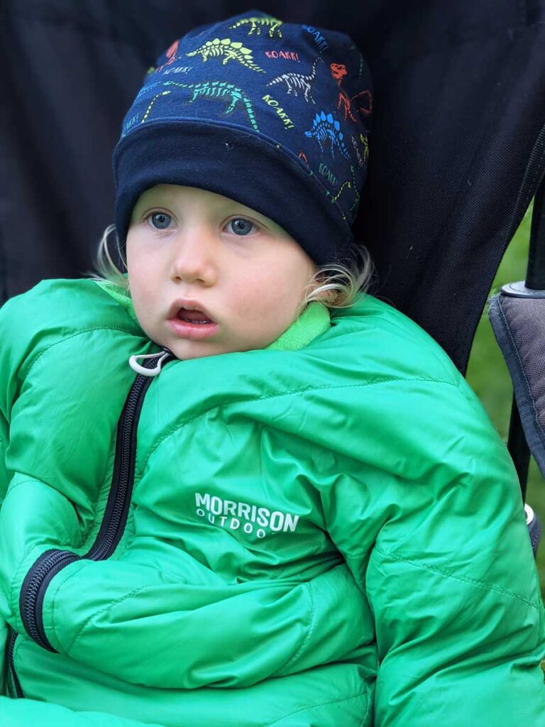 Toddler wearing Morrison Outdoors Sleeping Bag - One of the best sleeping bags for toddlers camping