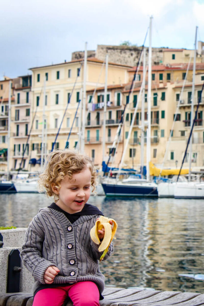 toddler eating banana