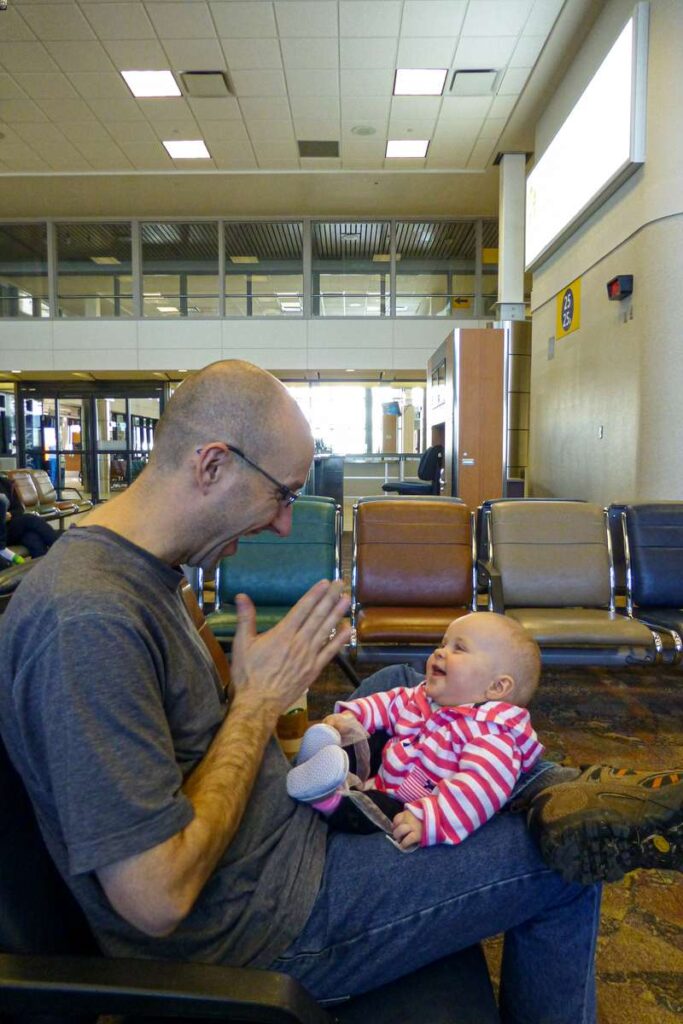 arrive at the airport early to try and get an extra airline seat for your child