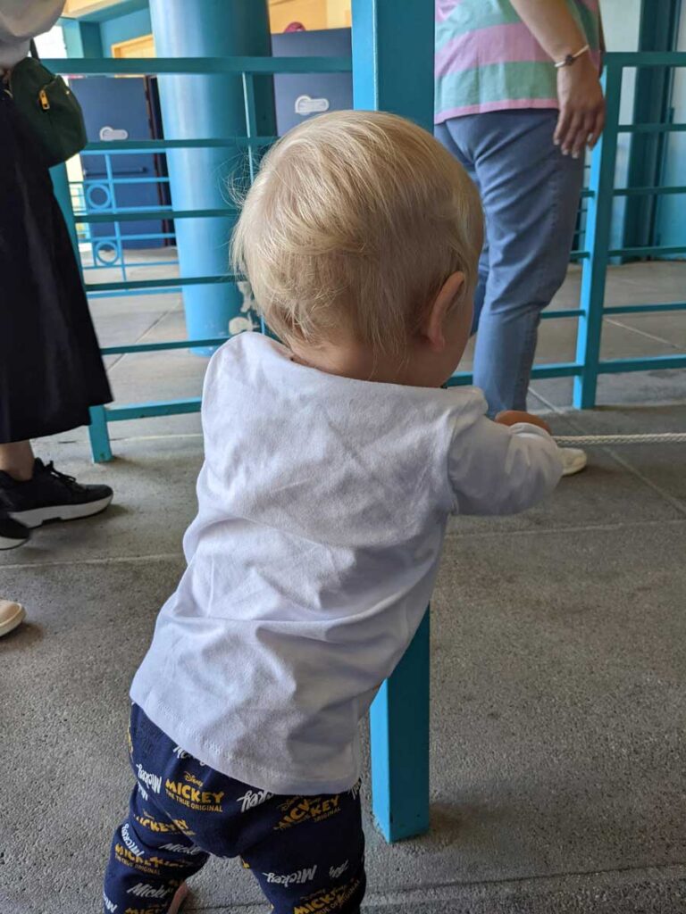 Baby standing in line at EuroDisney Paris