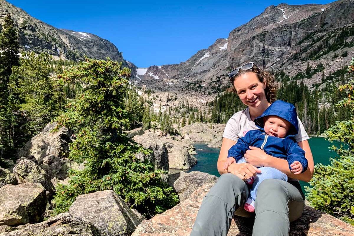 Mom holding baby on Bear Lake Hike - Rocky Mountain NP Hikes with a baby