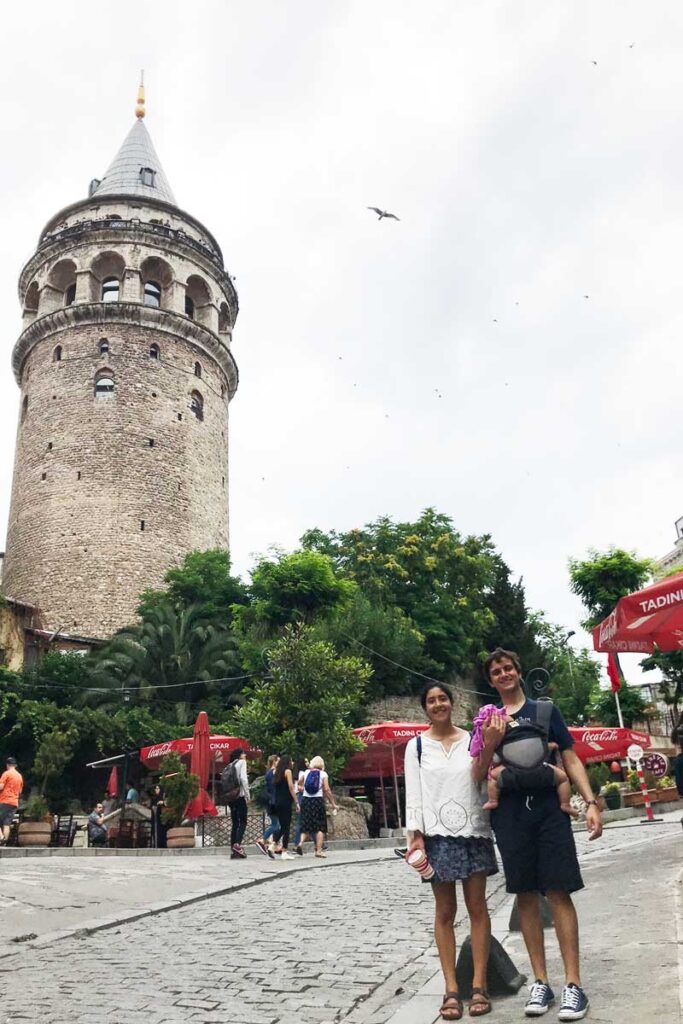 Parents holding baby while visiting Istanbul with a baby