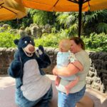 Mom holding baby at Disneyland Paris