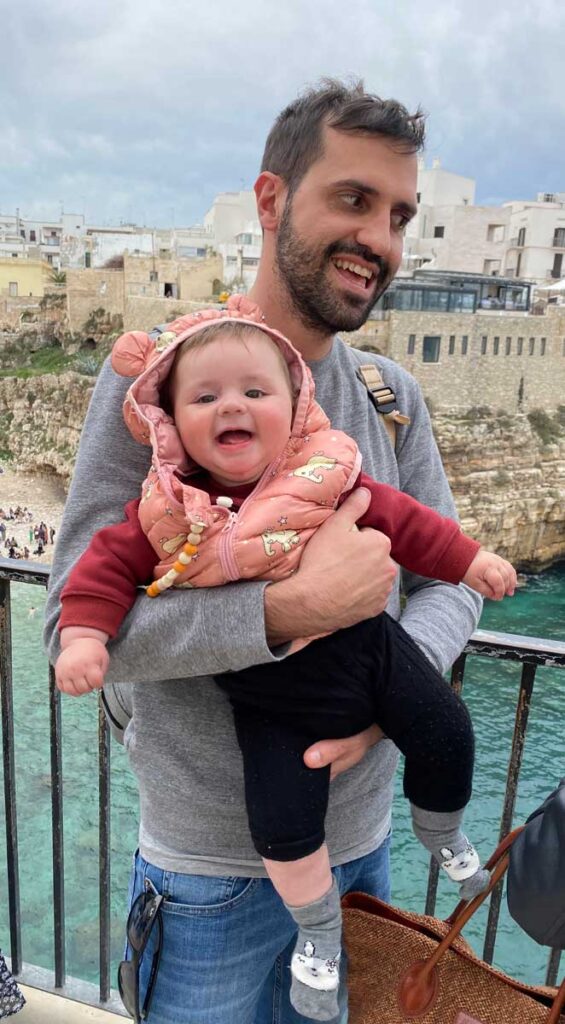 Polignano a Mare - father holding baby