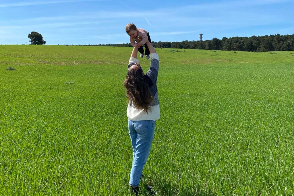 woman holding baby in Puglia Italy