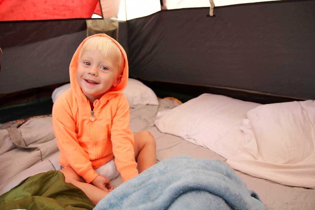 toddler in tent